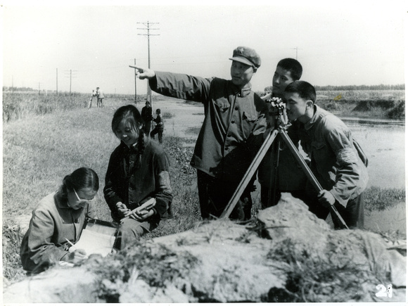 The Peoples Liberation Army instructing students of the Beijing 13th Middle School in land surveying
