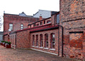 Period style brickwork and pedestrian area around the Chemung Valley Historical Society museum entrance