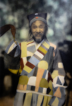 Example of a color(ized) photograph of a Daoist priest (based on an original print by John D. Zumbrun, Beijing, 1910s)