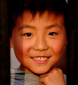 School boy, glowing in the afternoon sun (Handan, China)