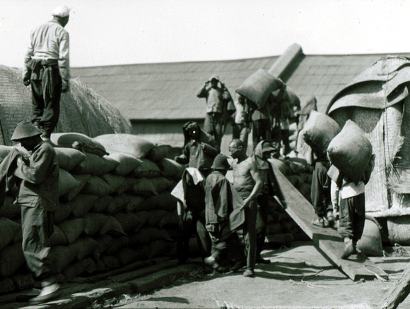 Loading soy beans at an oil mill in Dairen [Dalian]
