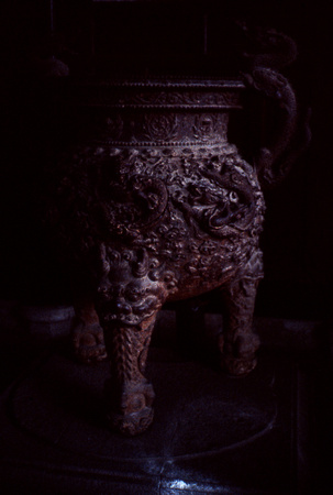 An old bronze cast tripod