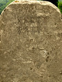 Old inscription, text mostly faded away
