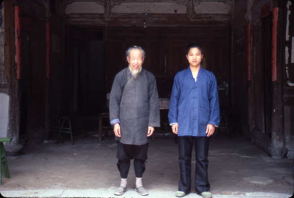 Two generations of Daoists; the middle age generation is missing