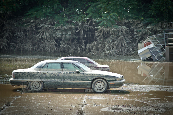 Flooded cars, Owego, Sep.14, 2011; note the change in color in the background as to the  water level