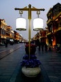 Street lighting, always bordering on the extravagant in China, takes the form of dual bird cages here