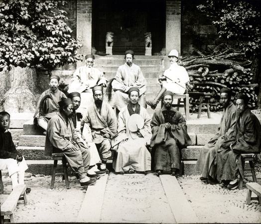 Daoist monks with what appears to be a British military officer, Shandong, ca. 1900