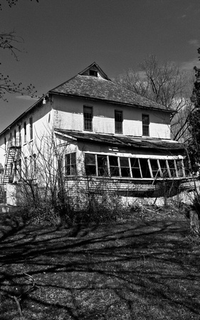 Old farmhouse of grand proportions, no longer lived in