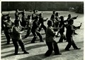 Workers at a textile factory in Tianjin doing shadow boxing (Taiji quan)